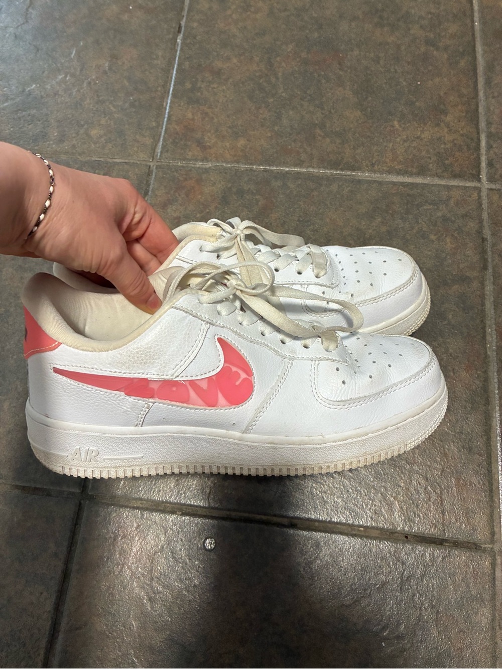 Nike White Low-Top Sneakers with Pink Swoosh